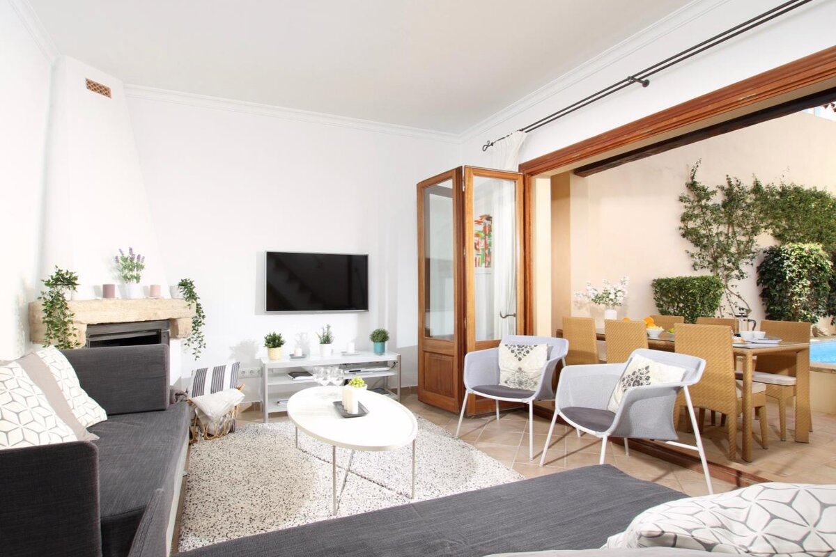 A living room with a couch and a flat screen tv