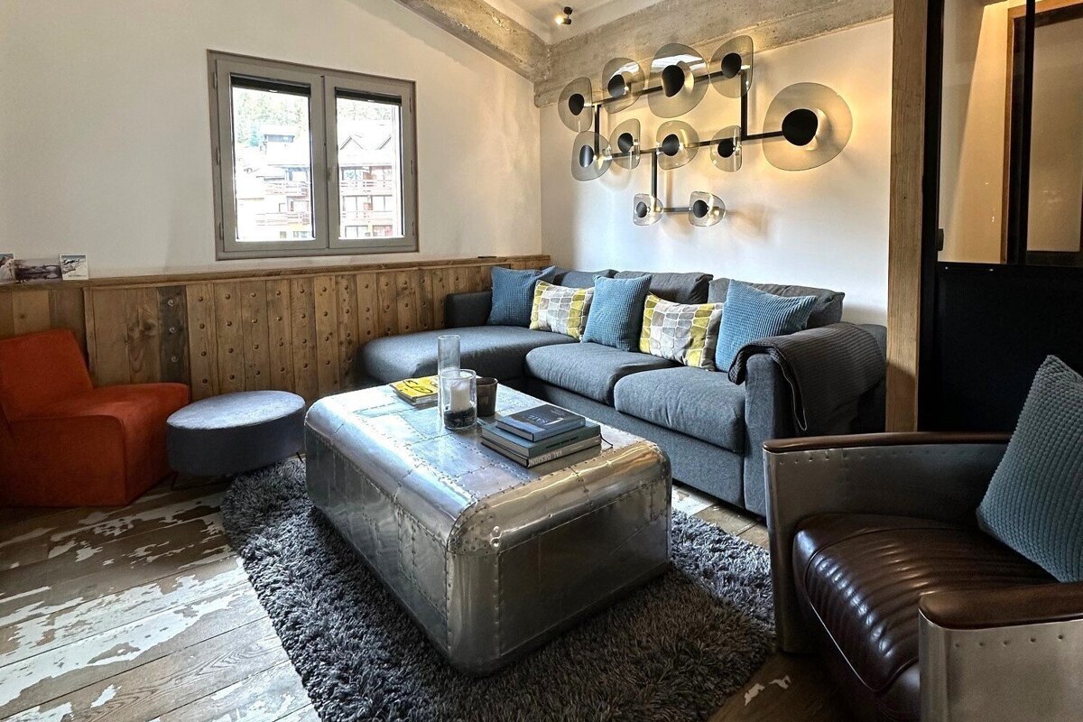 A living room with a couch and a coffee table