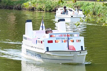 A white boat with the name brittany ferry on it