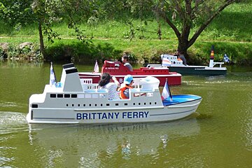 A white boat with brittany ferry written on it