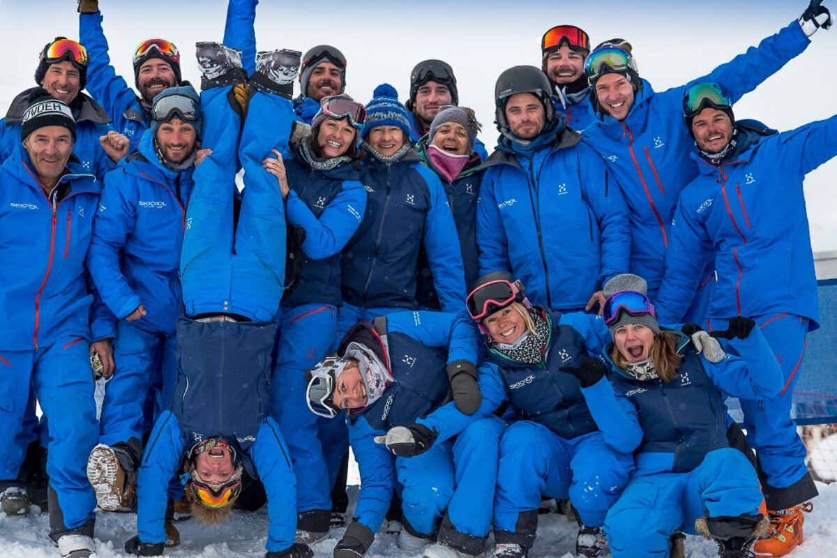 a group of ski and snowboard instructors