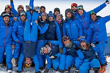 a group of ski and snowboard instructors