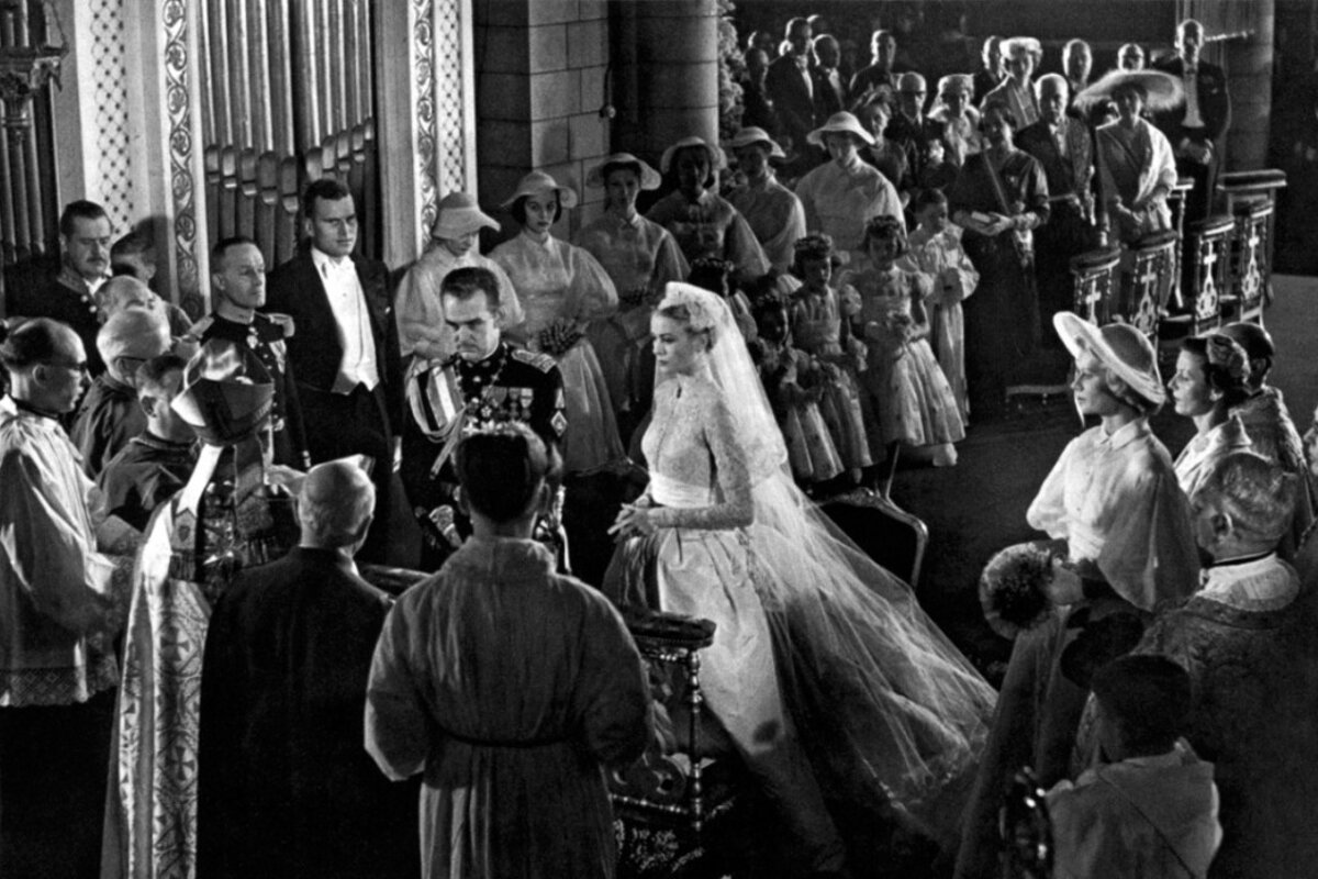 A black and white photo of a wedding ceremony