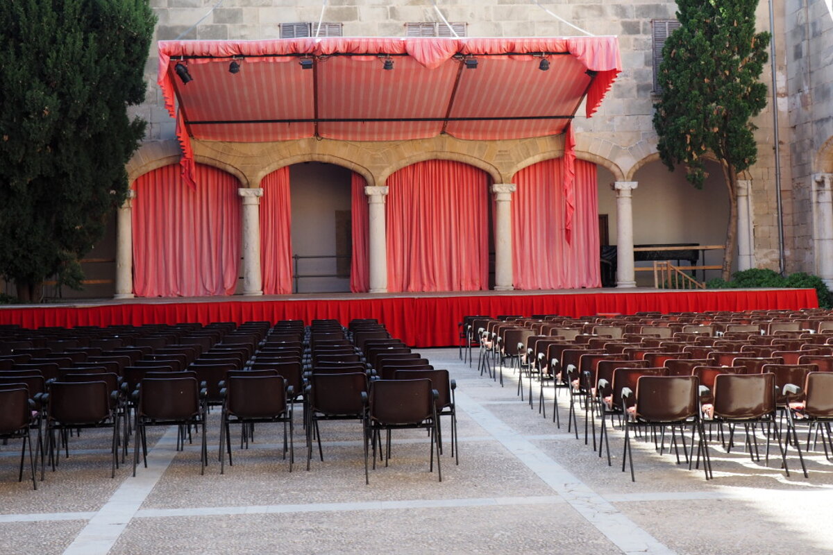 chairs facing a stage in pollensa