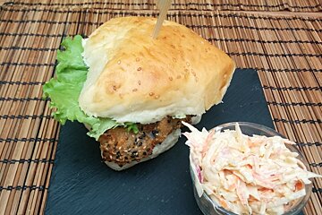 Fish burger & slaw on a black slate