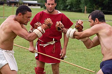 two men sparring in Roamn costumes