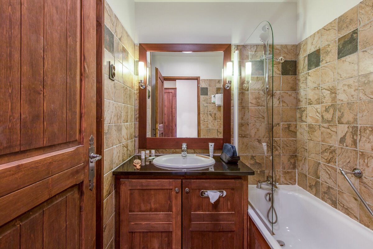 A bathroom with a sink and a bathtub