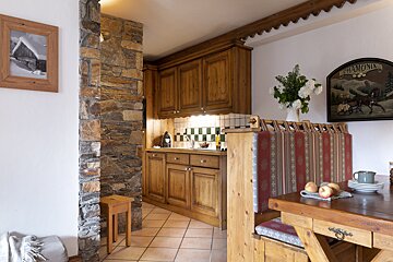 A kitchen with a sign above it that says chamonix