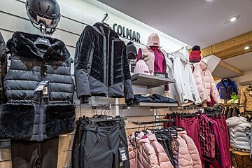 A store display of colmar jackets and hats