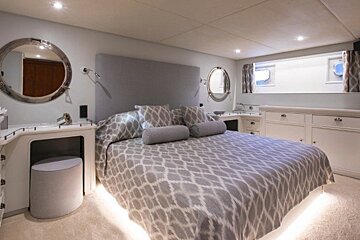 Tastefully decorated bedroom onboard Stalca