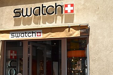 image of the swatch shop front with yellow cement on the outside