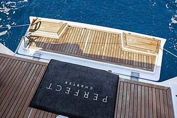 A perfect charter mat is on the deck of a boat
