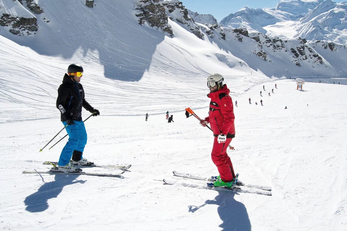 a group of ski and snowboard instructors
