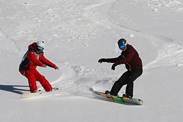 a ski instructor giving a private lesson