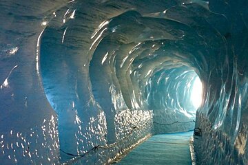 a cave carved into a glacier
