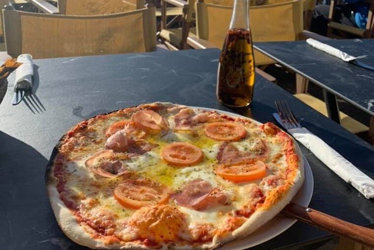 Pizza on the terrace at La Taniere, Avoriaz