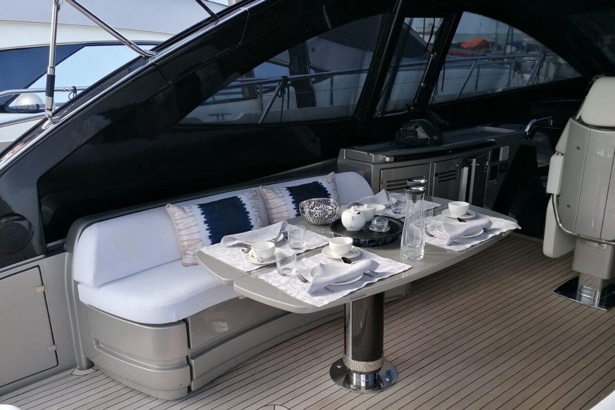 A boat with a table set for a meal