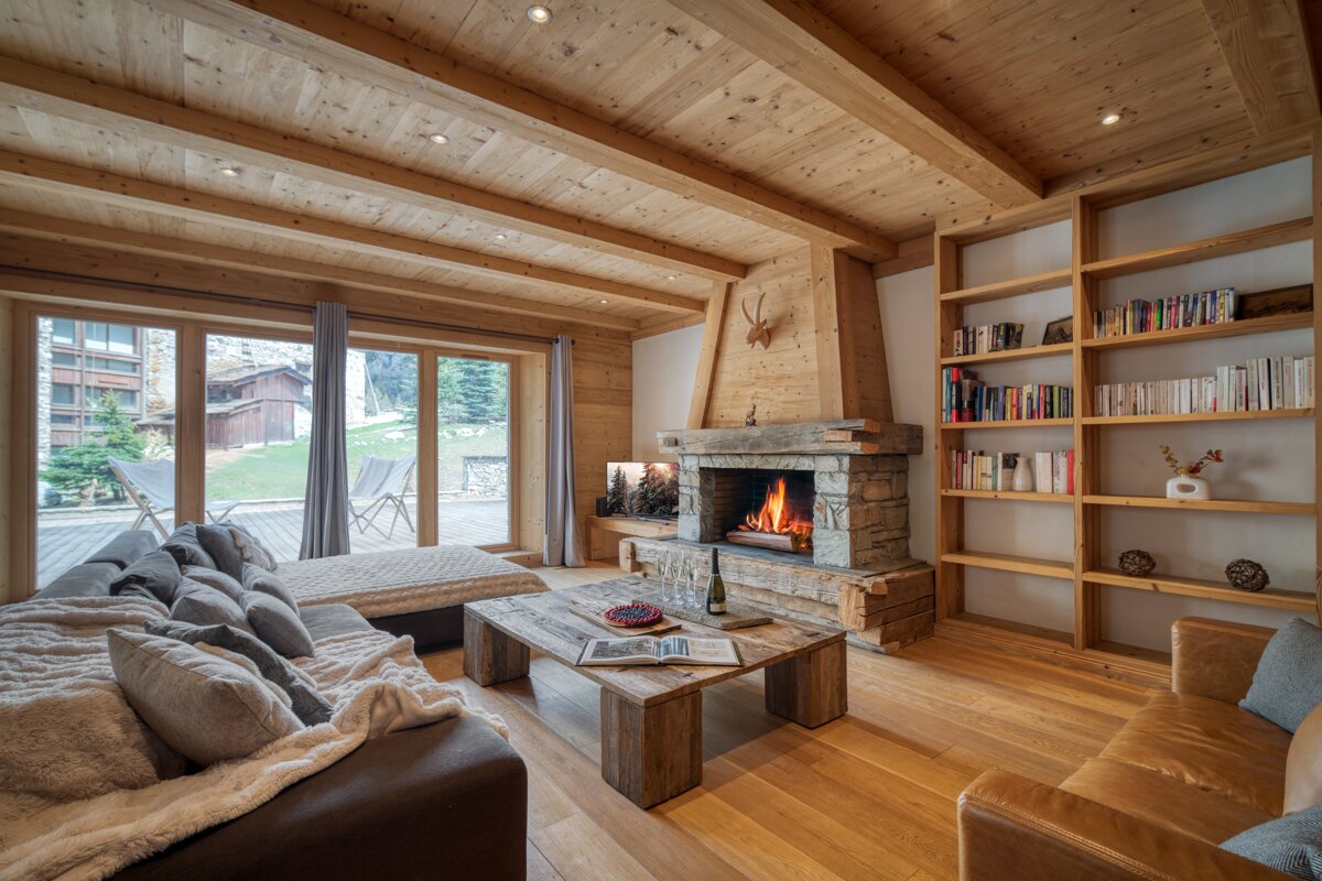 A living room with a fireplace and a couch