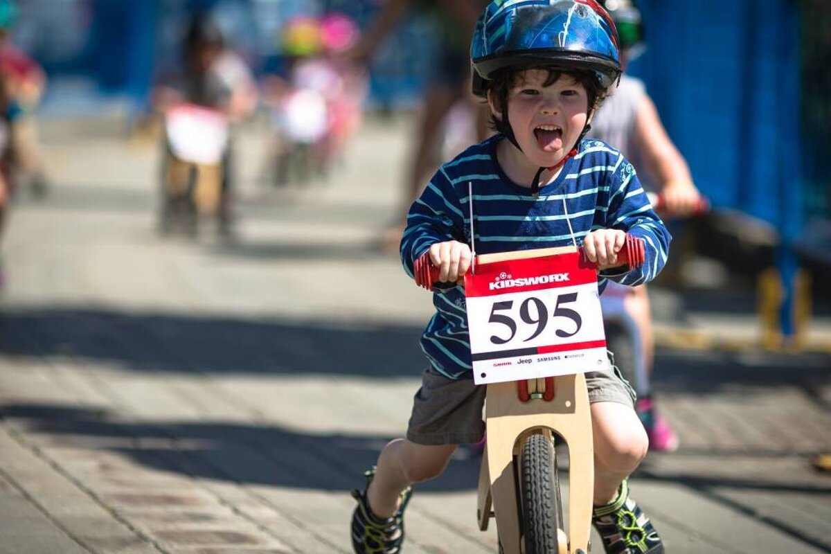 a small child on a mountain bike