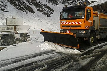 a snow plough clearing roads