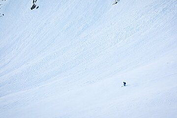 a skier in the distance