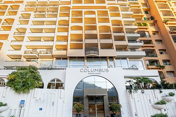 Columbus is written on the front of a building