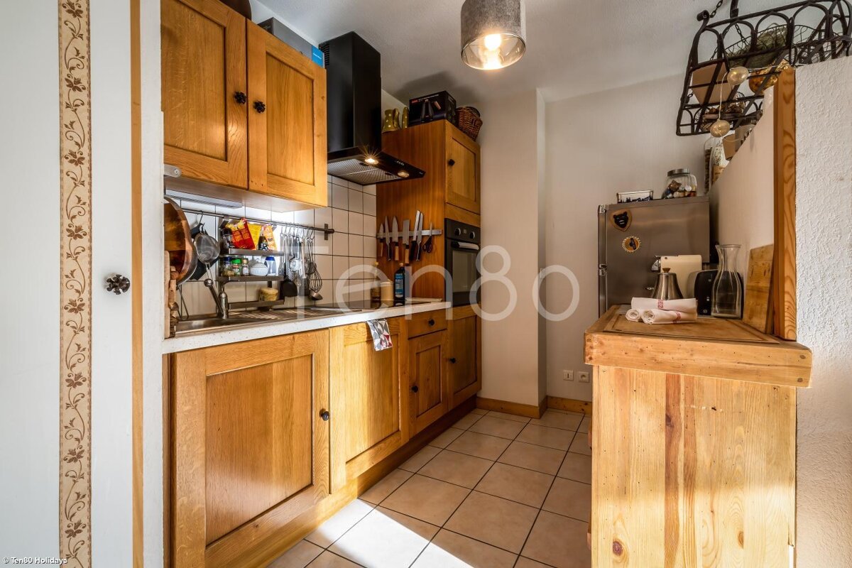 A kitchen with the number 80 on the wall