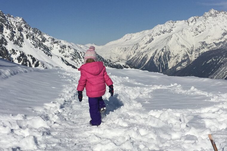 image of a child in the snow