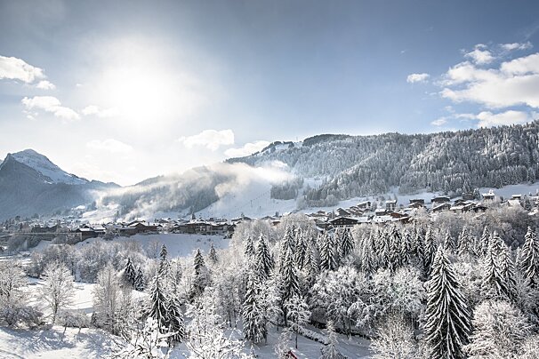 Morzine in winter covered in snow on a sunny day