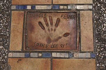 image of hand prints in stone
