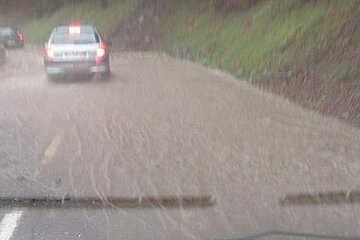 a very wet road to les gets near morzine