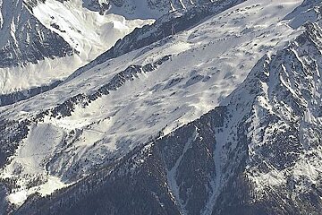 a large rocky bowl on the mountain side