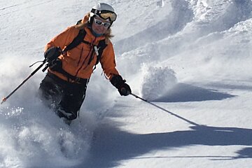 Close up skier in powder