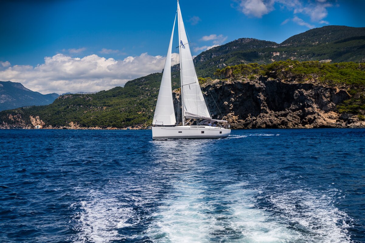 A sailboat with the letter a on the sail