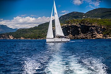 A sailboat with the letter a on the sail