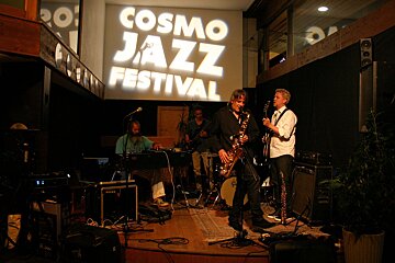 An image of musicians playing a concert