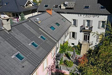 A building with the word le faucigny on it