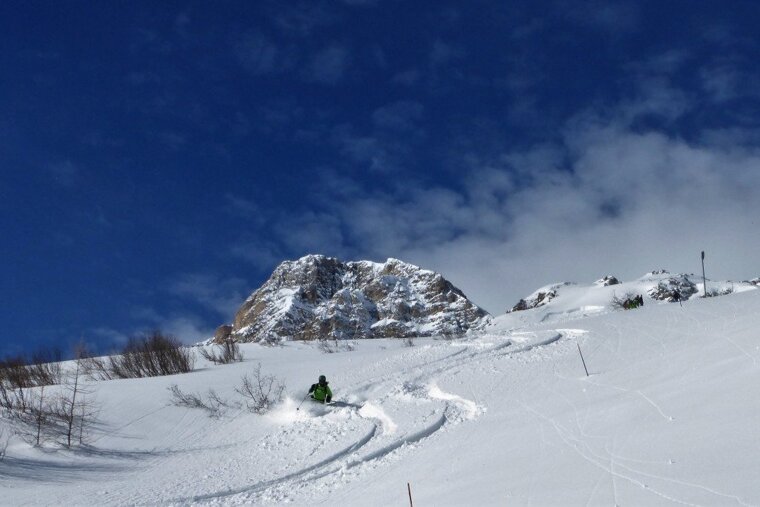 a skier on piste in val disere