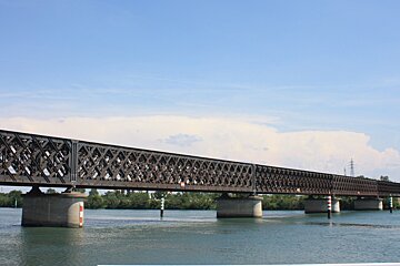 a train bridge over the river in provence