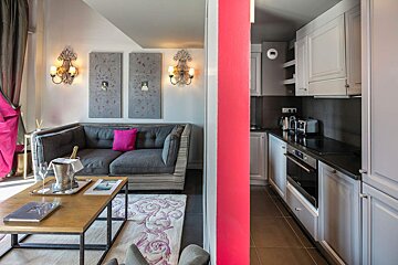A living room with a couch and a coffee table