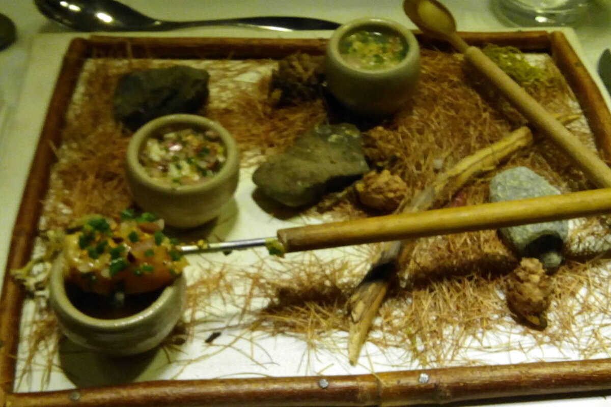 Frame of wood with three little verrines, pine needles and pine cones