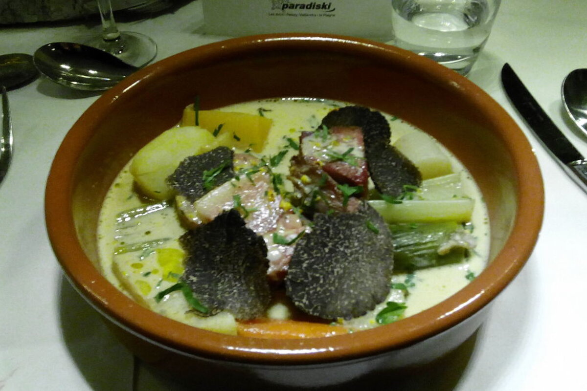 Truffles on top of a stew, cutlery