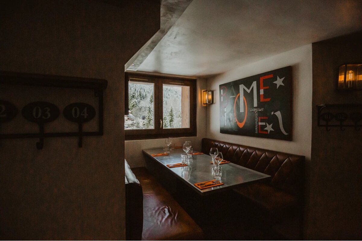 A restaurant with a sign that says rome on it