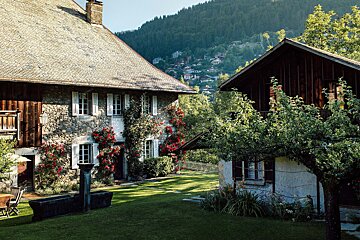 A house with a roof that is covered in shingles