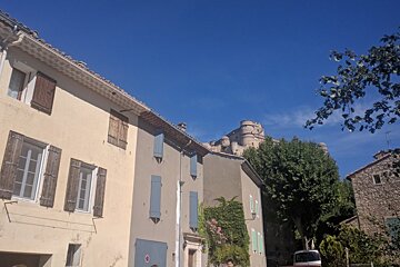 a castle and stone houses