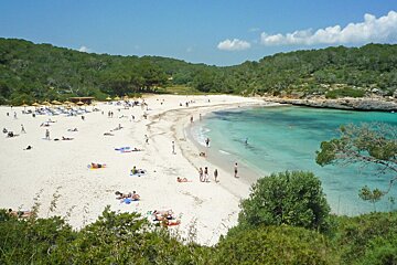 sandy beach with clear blue sea mallorca