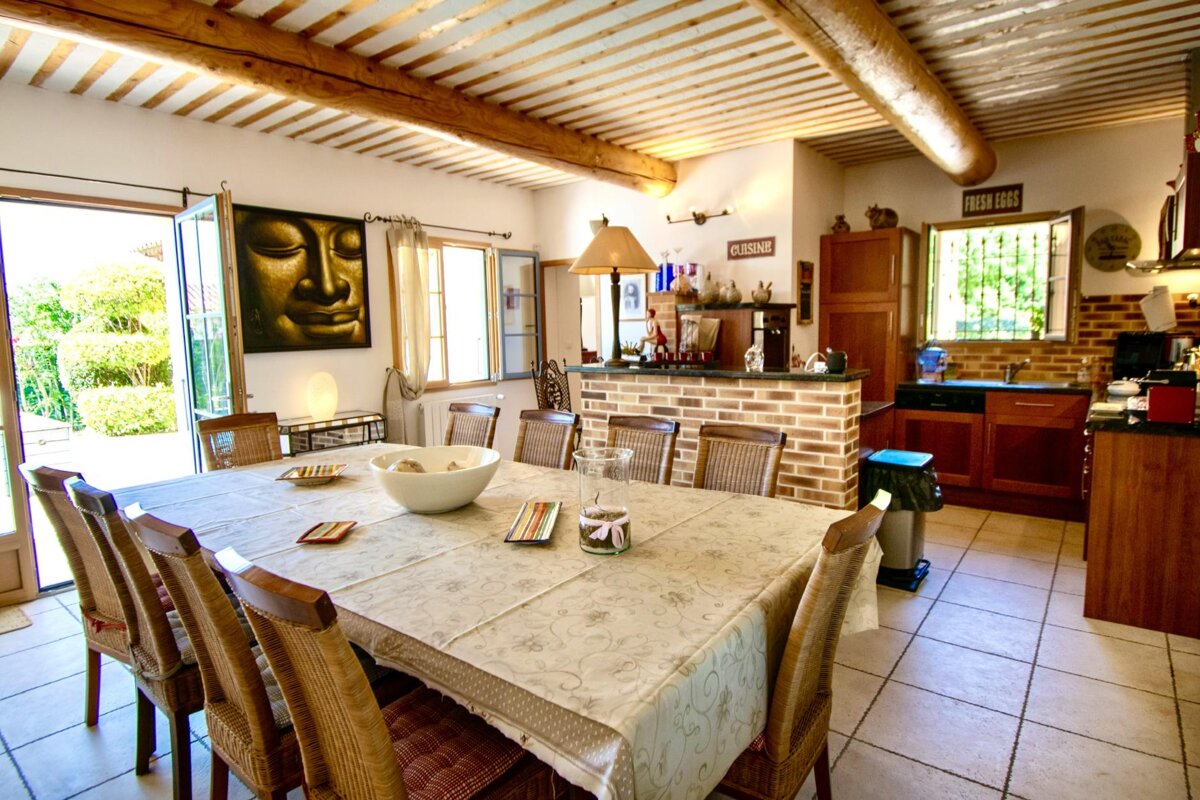 A kitchen with a sign that says cuisine on it