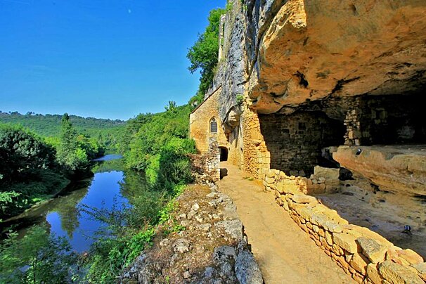 a home built into the rock in village la madeleine