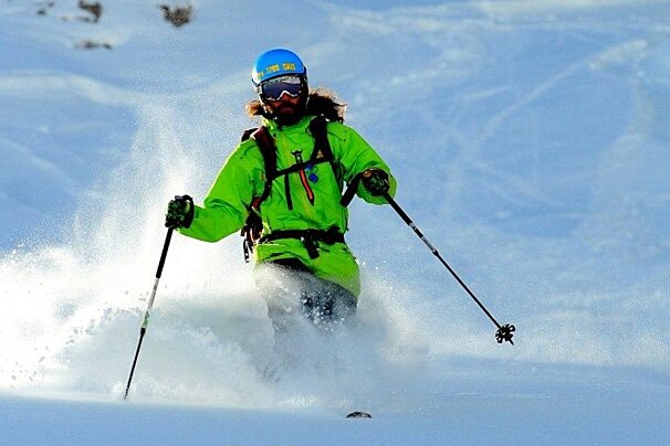 telemark skiing in the powder sunshine