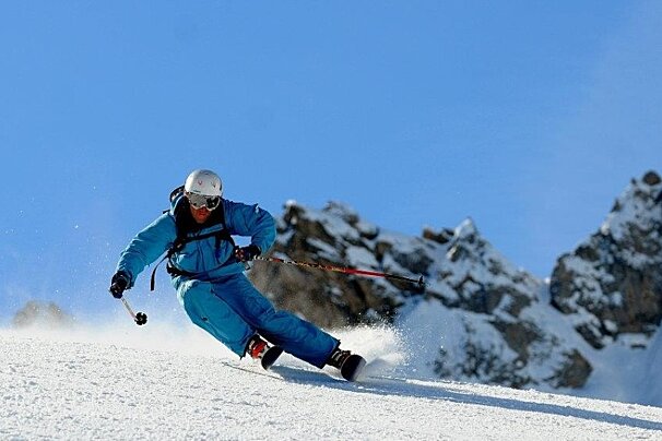 carving skier sunshine